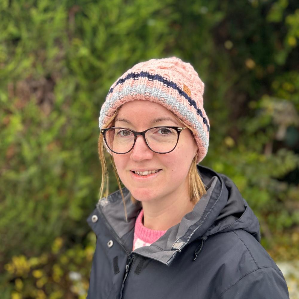womens fluffy bobble hat in pink