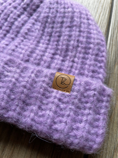purple warm hat for outdoor adventures